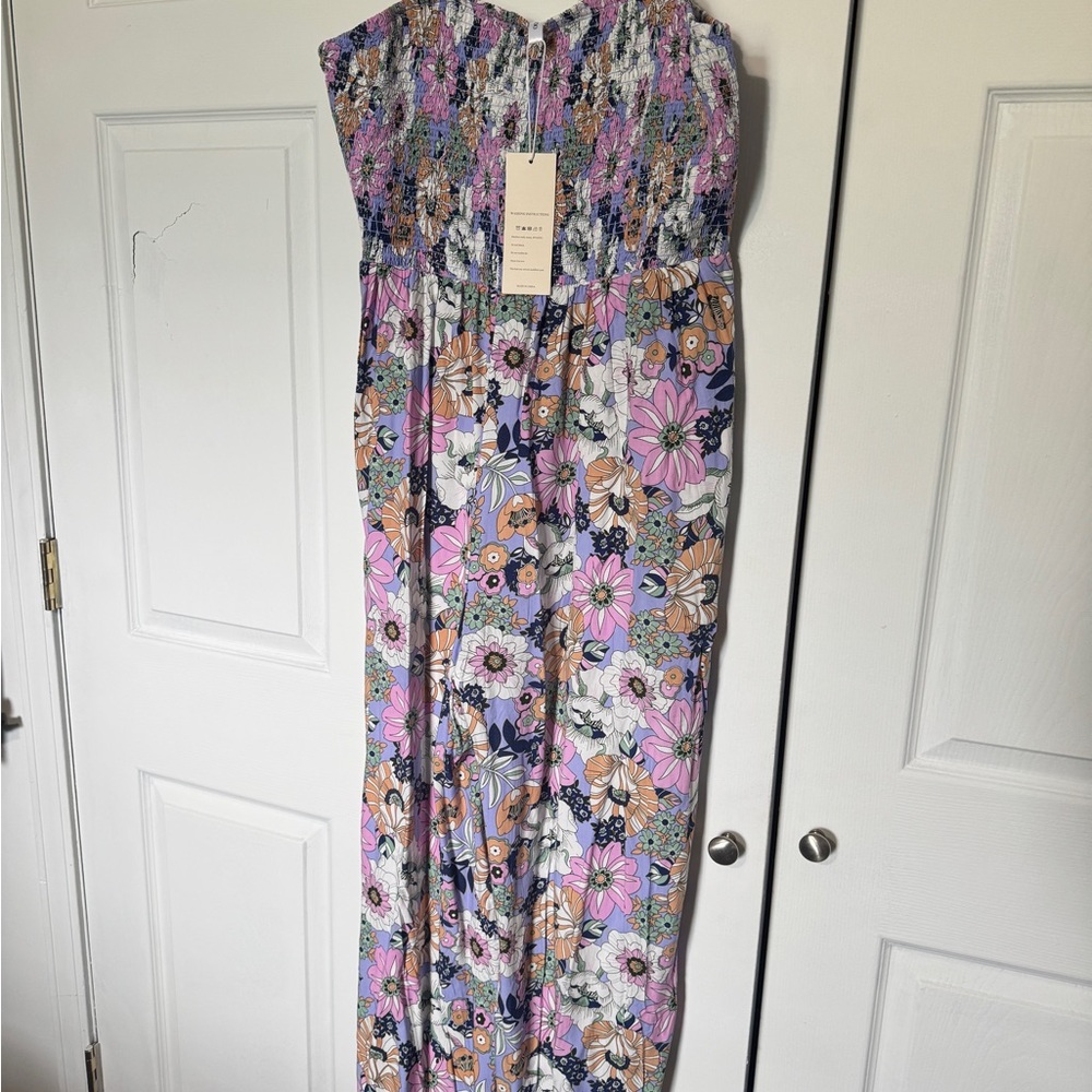 Never worn. Brand new with tags. Dokotoo jumpsuit. Size 2 XL